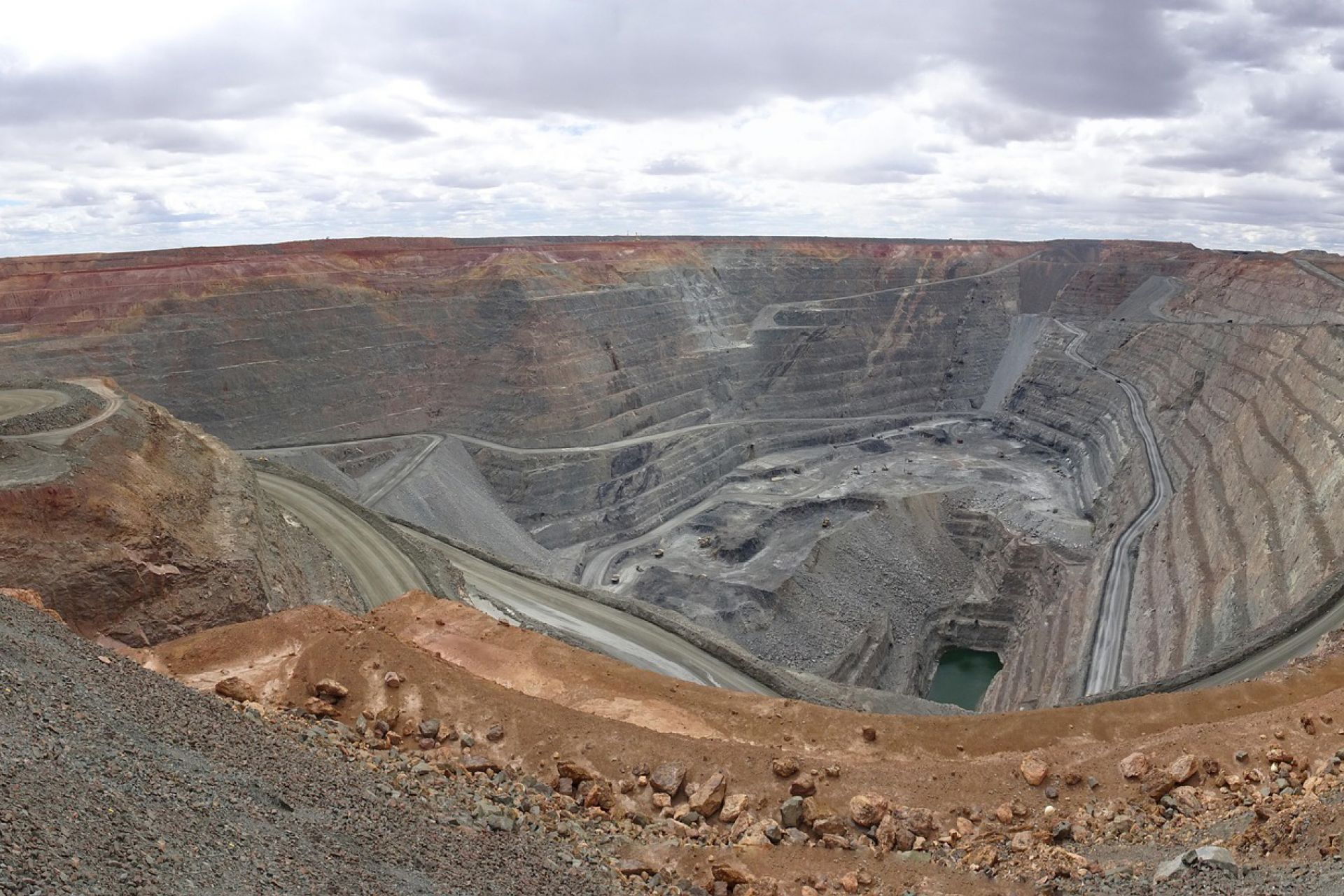 Photo of a gold mine showing the deep cut into the ground
