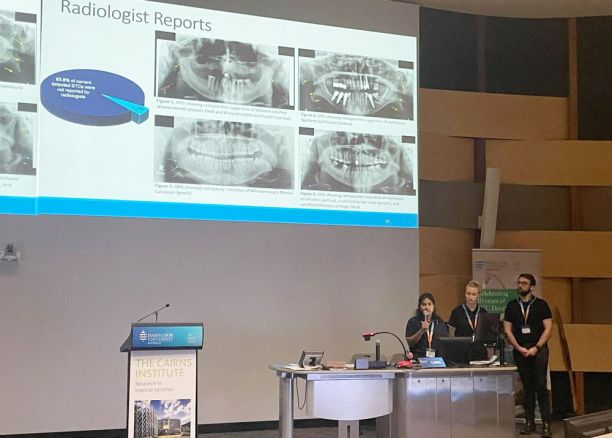 Fourth-year dentistry students presenting their findings at the clinical day