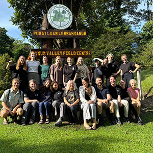 A group of JCU students in front of a sign reading "Danum Valley Field Centre"