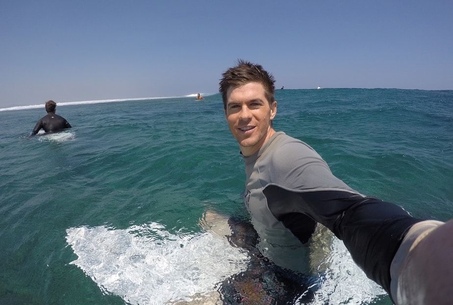 Andew Yates surfing in Fiji