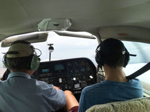 View of pilot and co-pilot in small plane