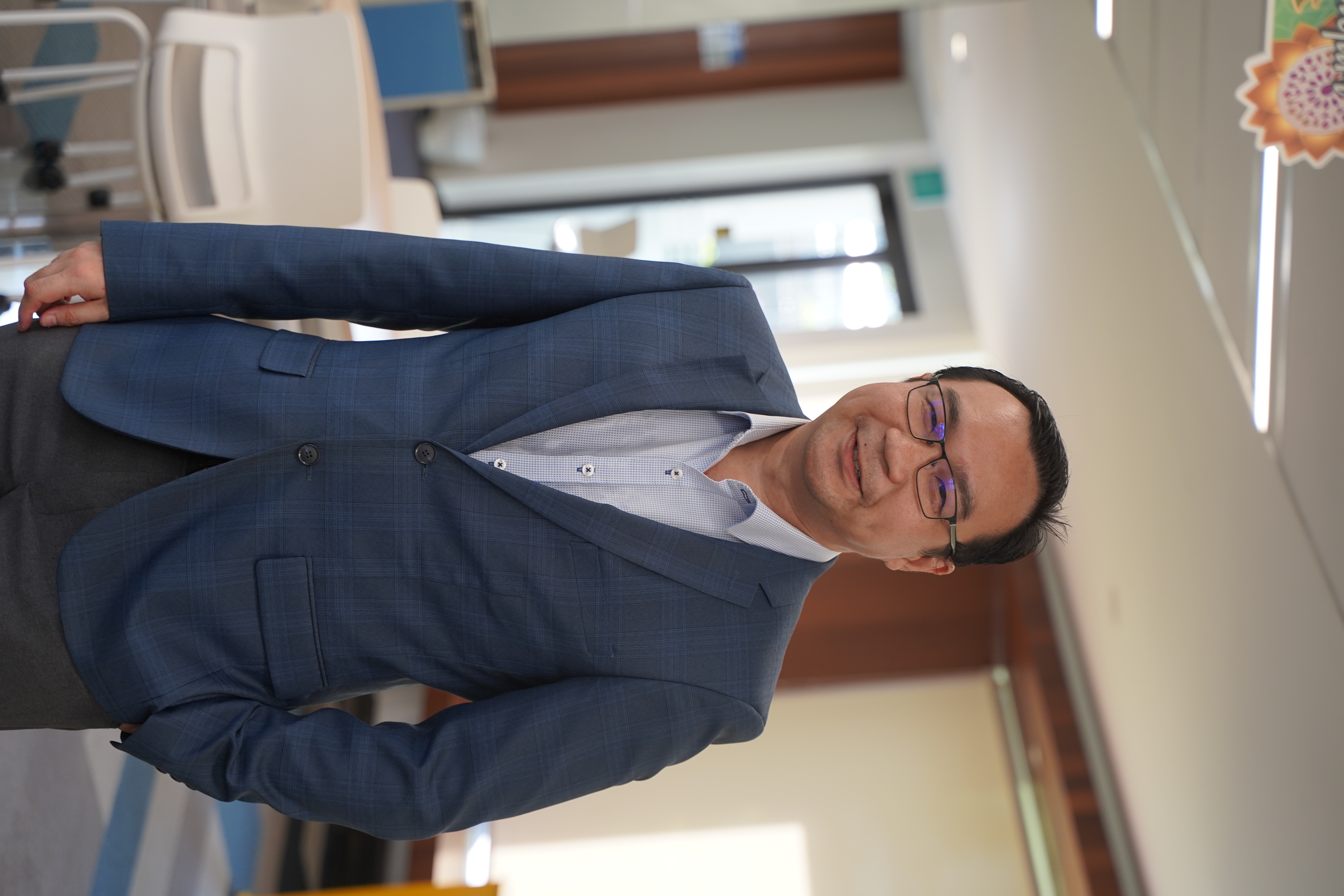 Dr Kim-Lim Tan
