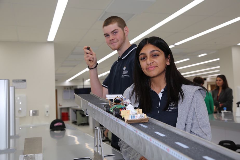 Engineering Futures - Residential Camp students Ananya Malik, from Gladstone State High and Jonty Heath-Coppin, from St Andrew’s Catholic College, crash test a model car.