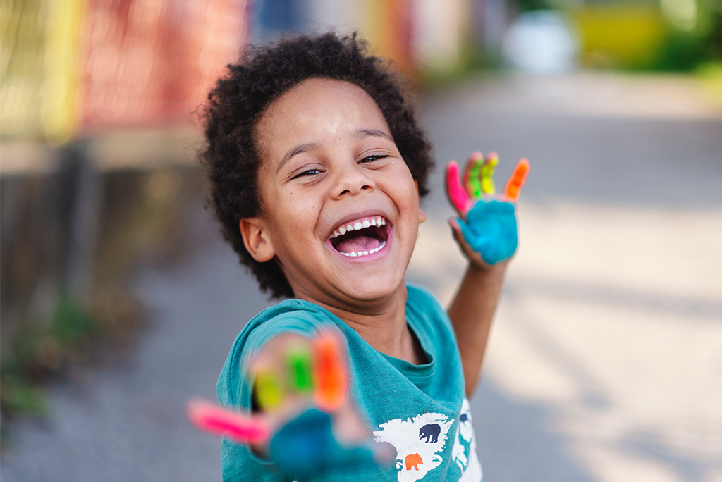 Young Boy Painted Hands 