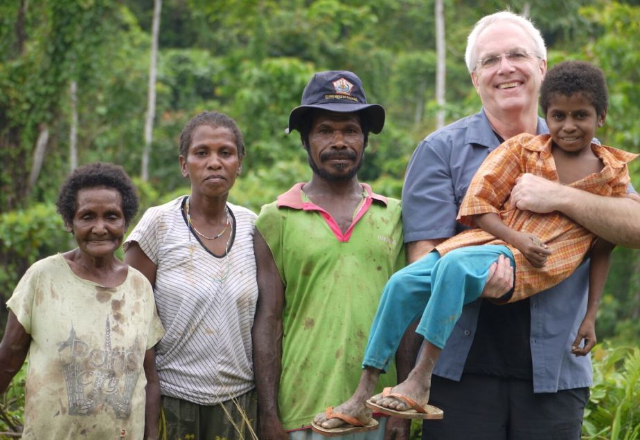Bill Laurance and traditional landowners in West Papua Province.
