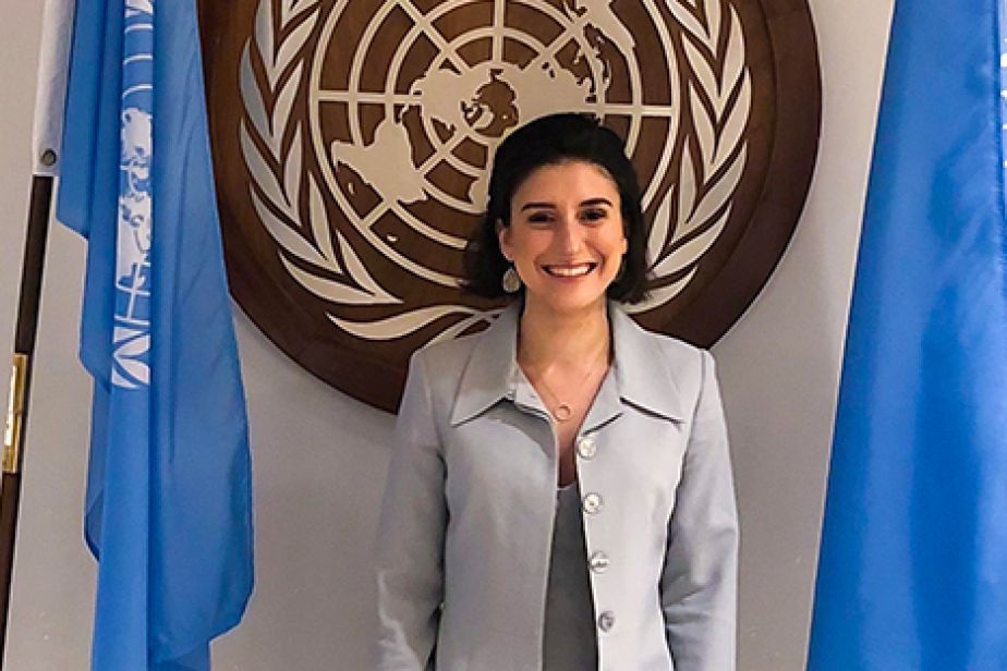 Elizabeth Nehme in front of UN logo