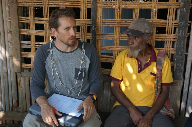 Prof. Josh Cinner talking to a villager in Muluk village, Papua New Guinea, as part of his research into ‘bright spot’ reefs