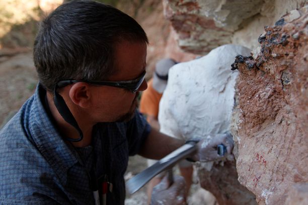 Eric Roberts excavating rockface
