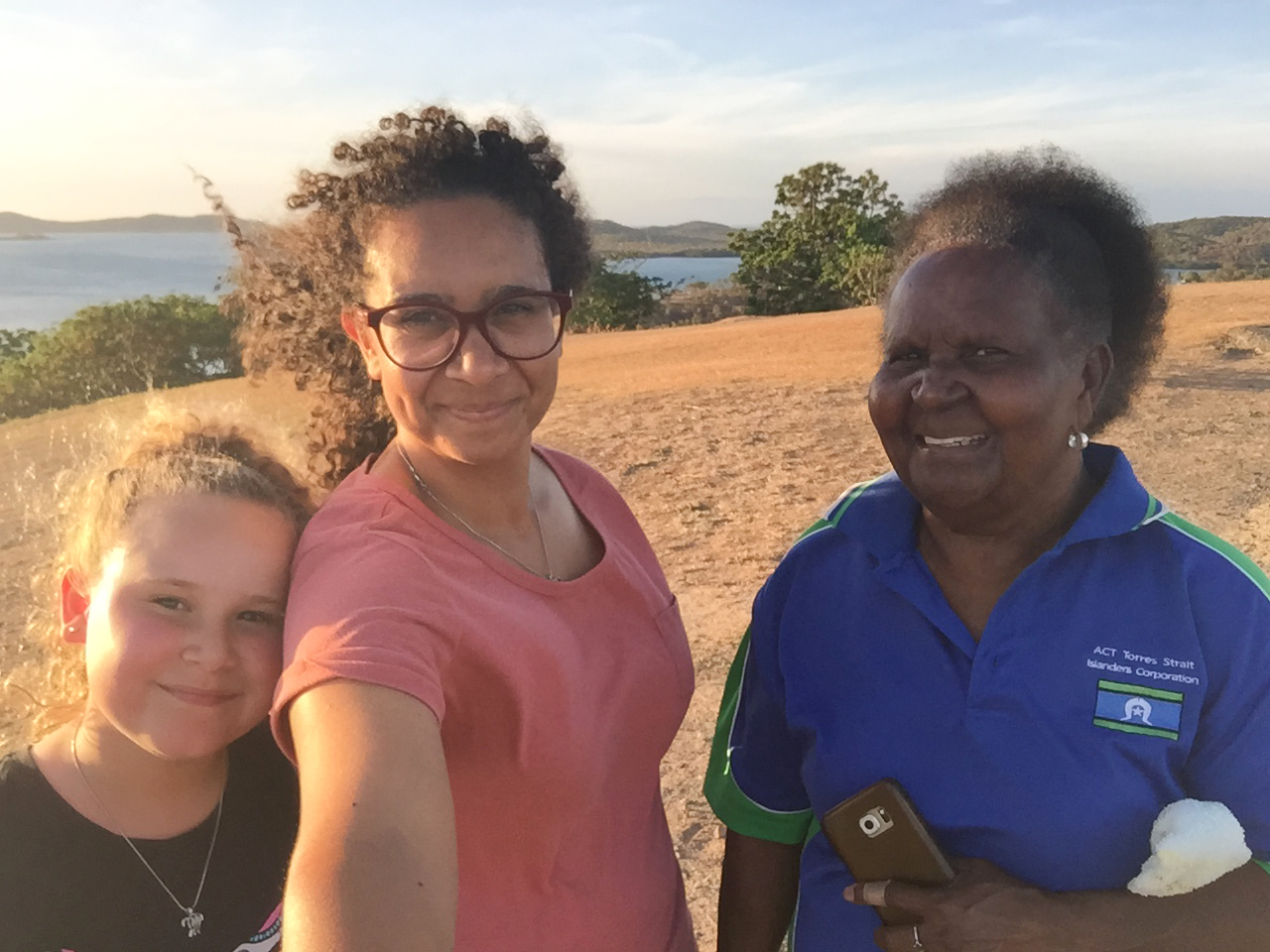 Torres Strait Islander woman with young child and older woman