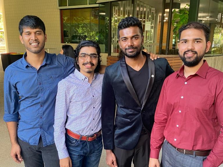 Bala (second from right) with some of his peers at their Graduation Ceremony.