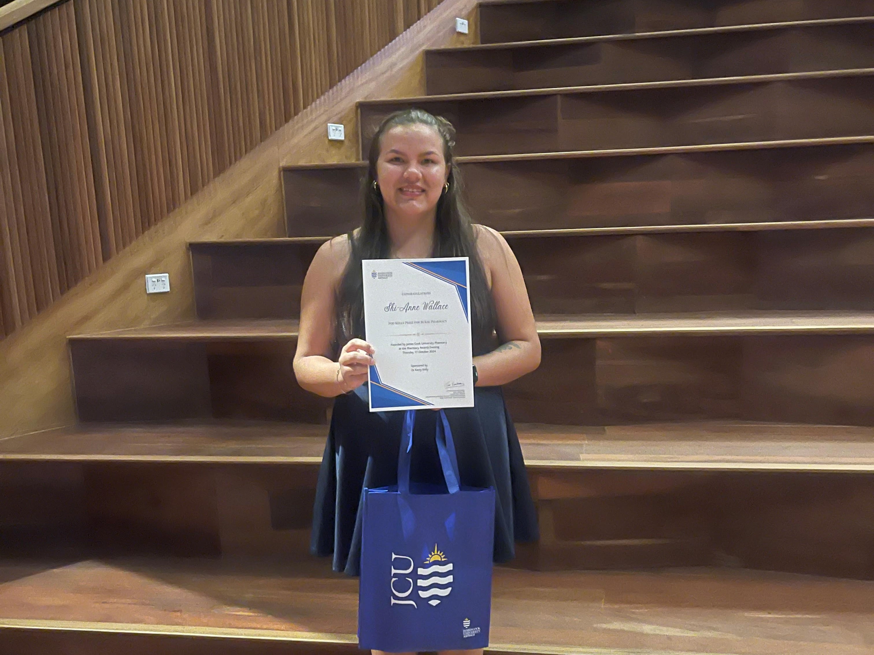 Shi-Anne Wallace receiving her pharmacy award at the 2024 JCU Pharmacy Awards evening