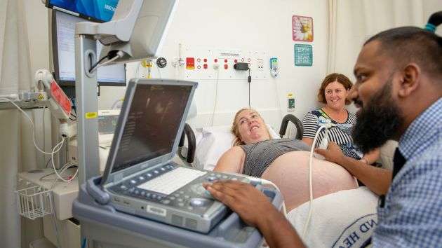 Dr Pradeesha Hettiarachchi conducts an ultrasound on a pregnant patient