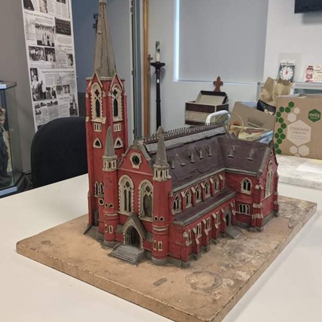 A maquette model of Sacred Heart Cathedral in Townsville made in the nineteenth century from plaster, lead and glass. 
