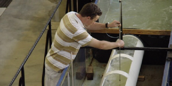 Photo of hydraulic laboratory model testing for Quad Baffle fishway for pipe culverts