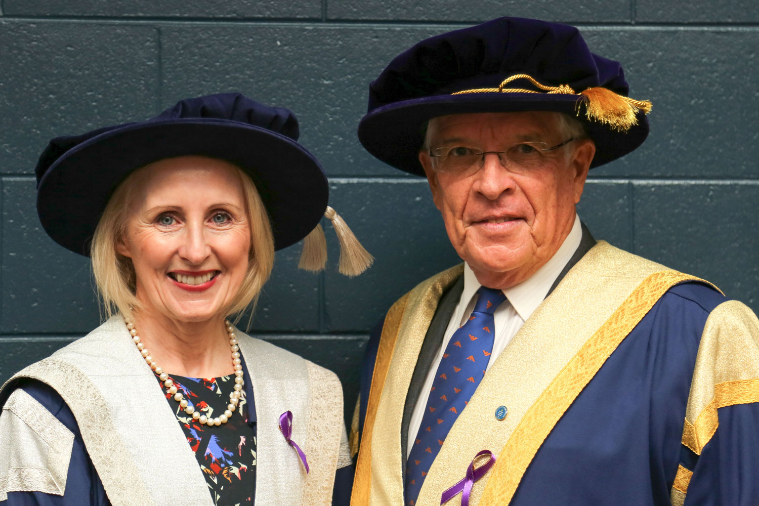 The Vice Chancellor and the Chancellor smile at the camera