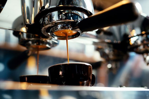 Italian coffee machine pouring coffee