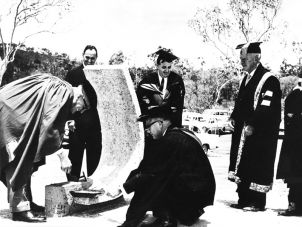 Setting the survey peg in place on the Douglas Campus is the Premier of Qld, the Hon. G.F. Nicklin, 7th November 1964.