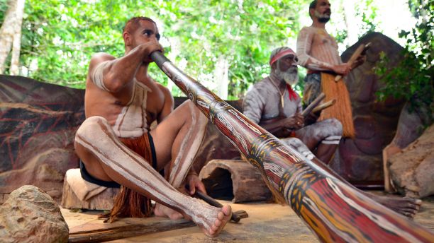 Aboriginal men playing digeridoo