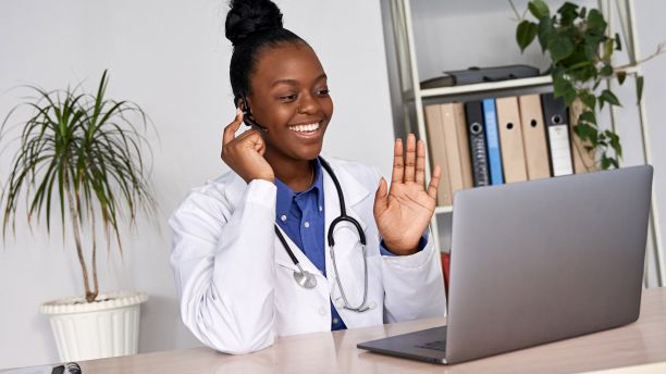 Nurse contacting colleagues through telehealth