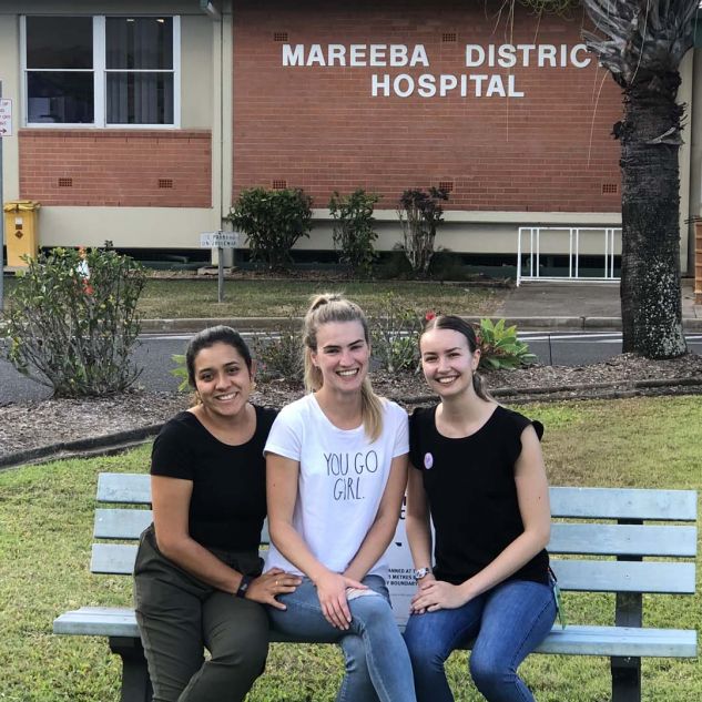 Kira with two fellow students outside the Mareeba hospital. 