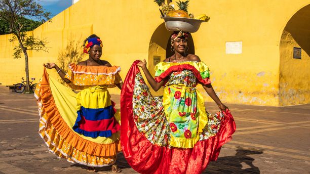 Women in Colombia wearing colourful dresses
