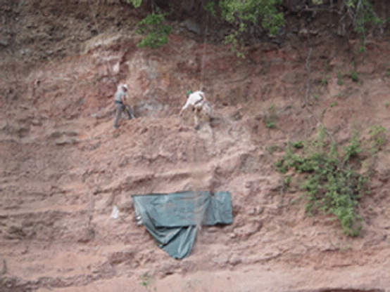 Eric Roberts, left, and Tobin Hieronymous looking for fossils on the Rukwa Rift