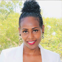 A headshot of Graduate Certificate of Research Methods alumni Tina Mengesha.  
