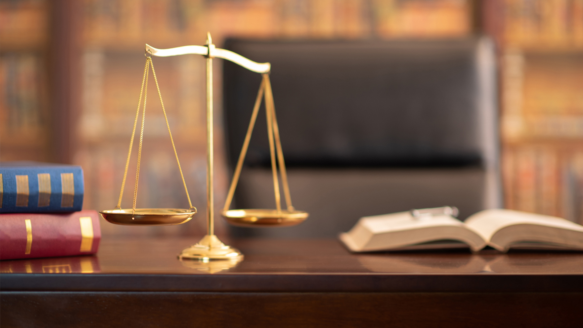 Judge scales sitting on a desk in a lawyers office. 