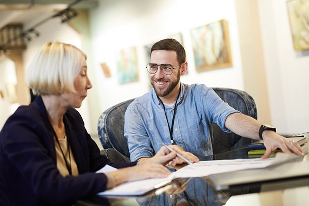 Historian talking with a client
