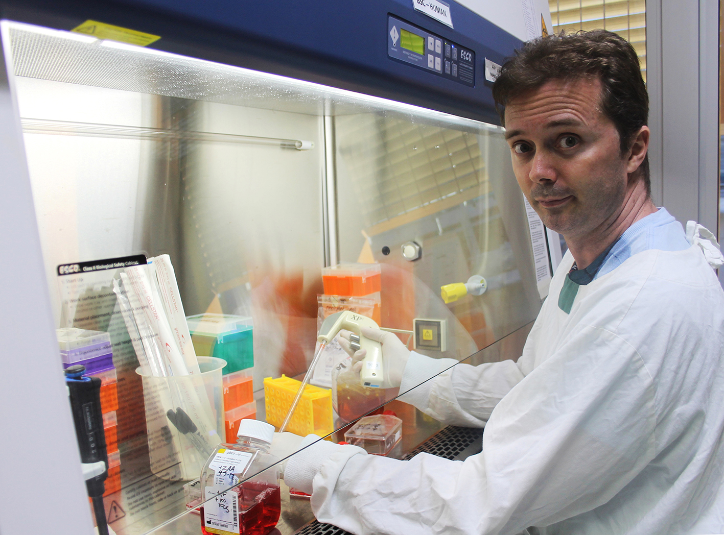 Michael Smout working in his lab