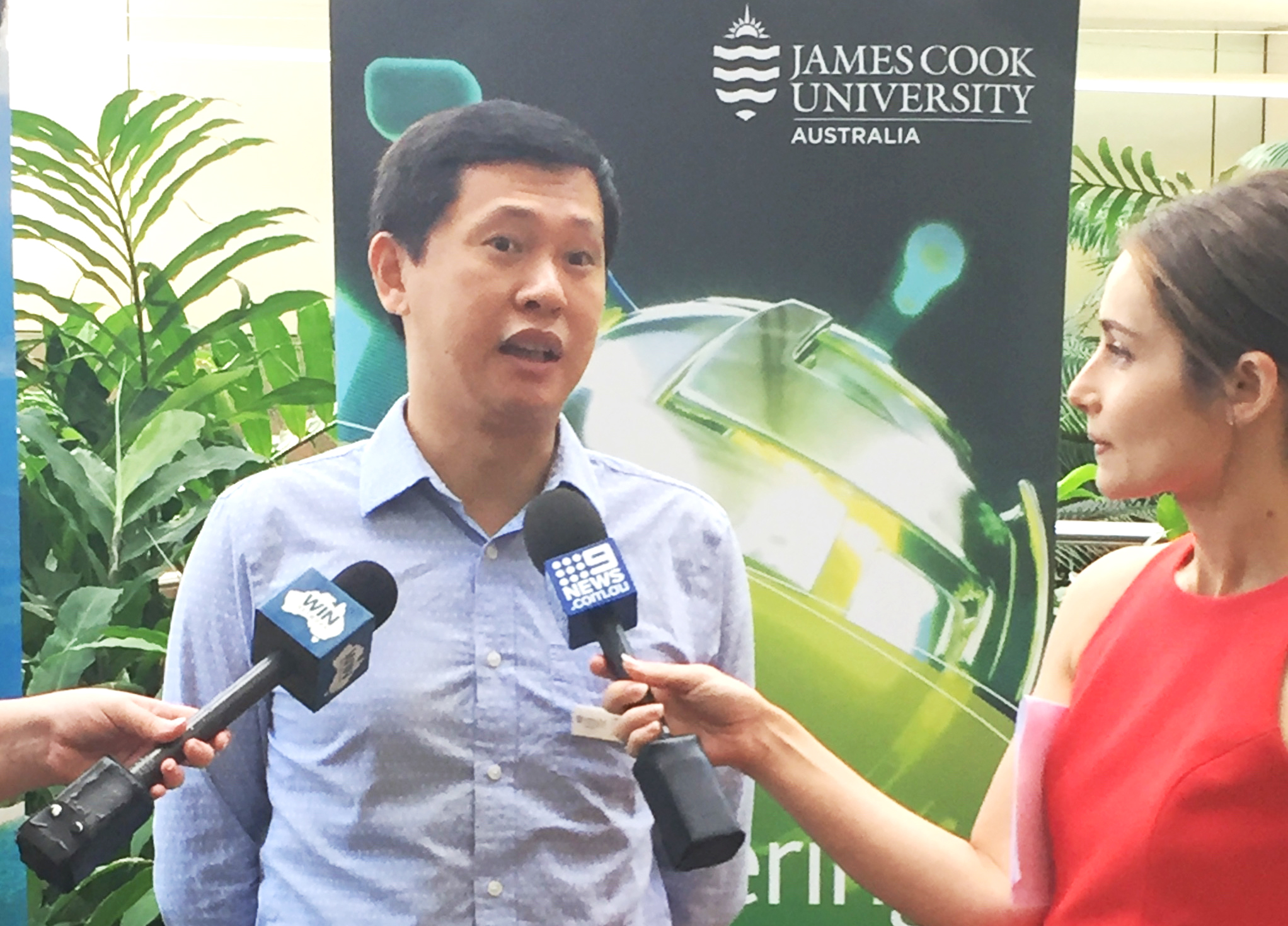 Professor Wei Xiang speaking to journalists
