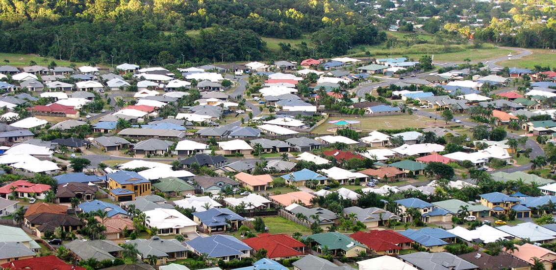 elevated view of a new suburb with palm trees