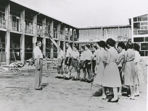 Warden of the University College of Townsville, Dr Frank Olsen with students