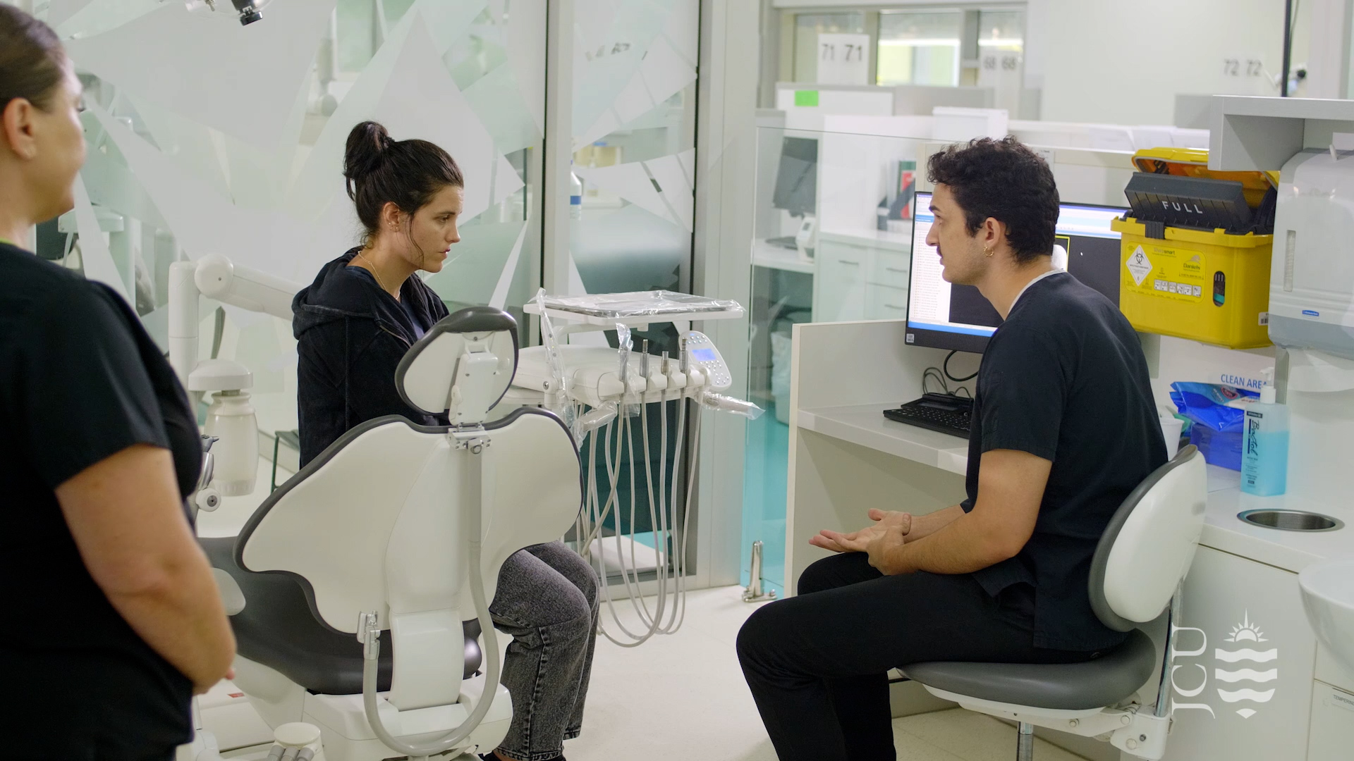 dentist and patient talking in clinic. 