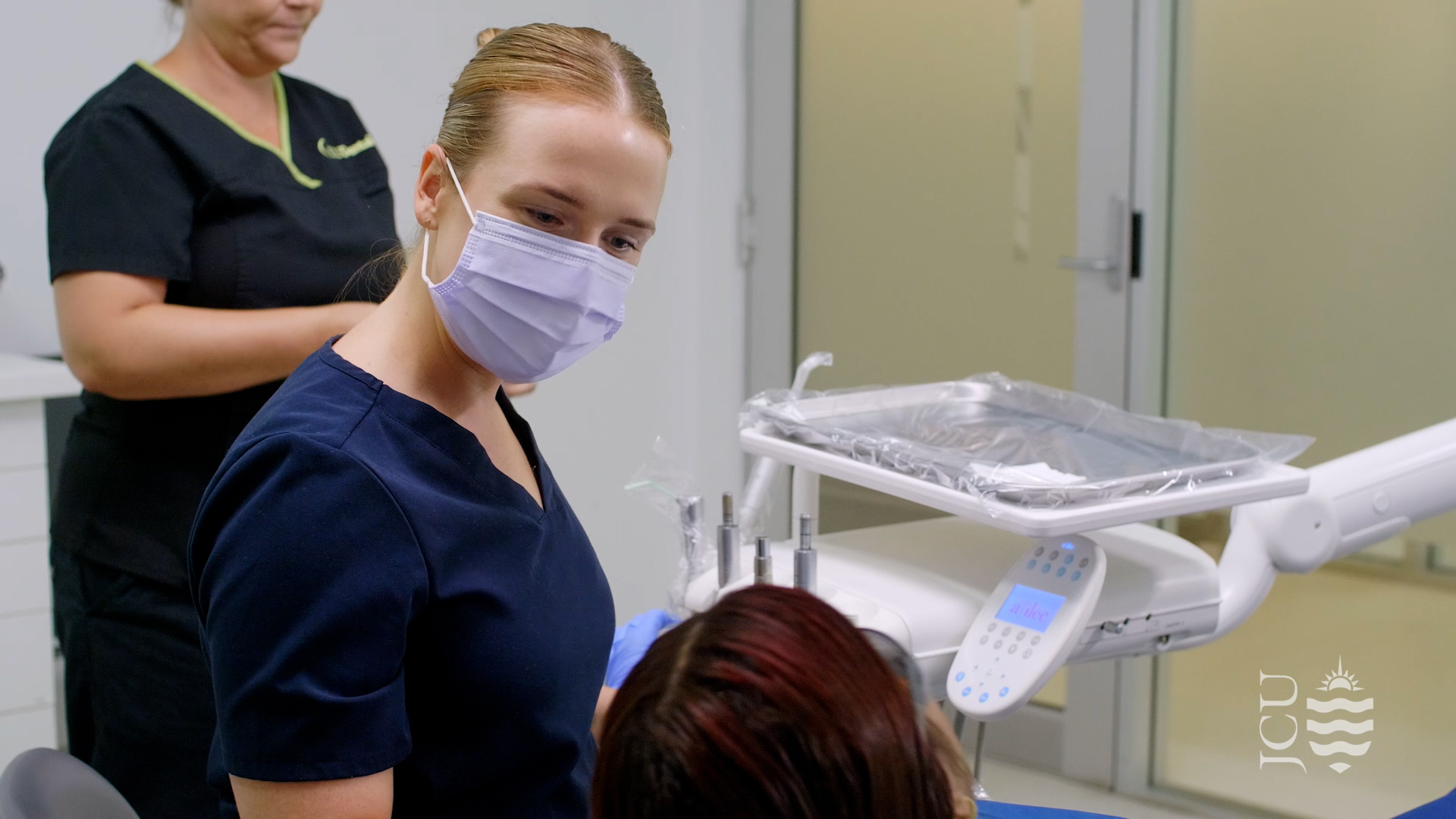 dentist talking to patient. 