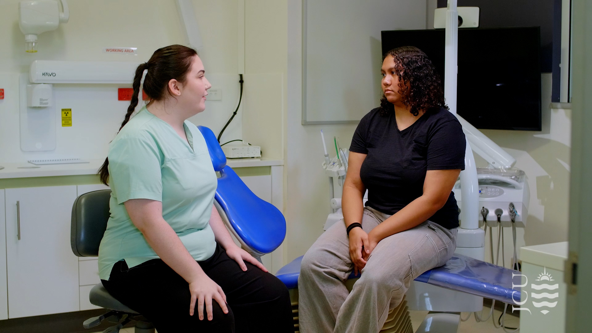 dentist and patient talking. 