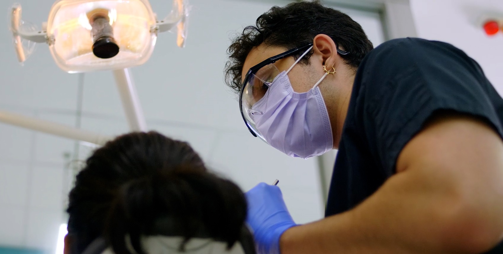 dentist examining patient