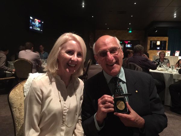 Sandra Harding with David Malouf displaying the H.T. Priestley Gold Medal at the Savannah Writers Festival in 2015