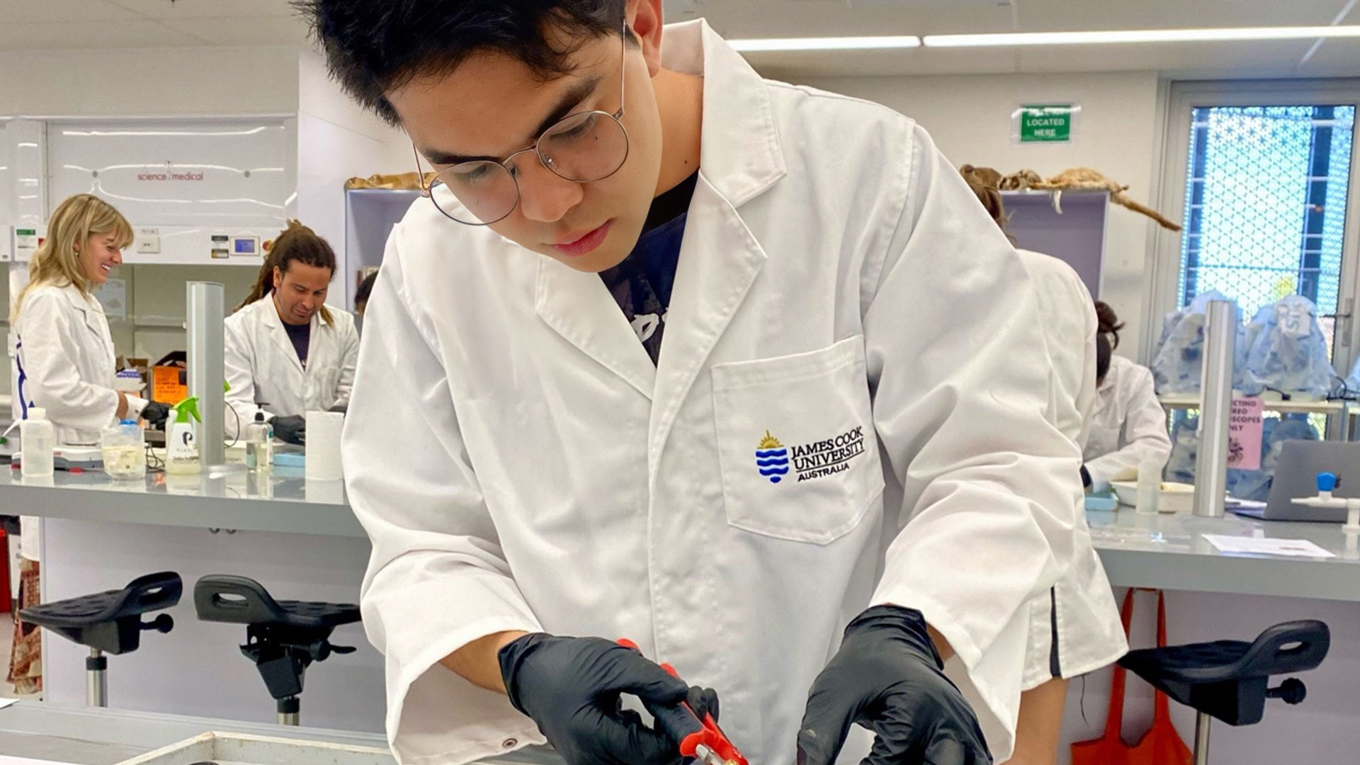 JCU Master of Science international student Christian Gino at work in the lab. 