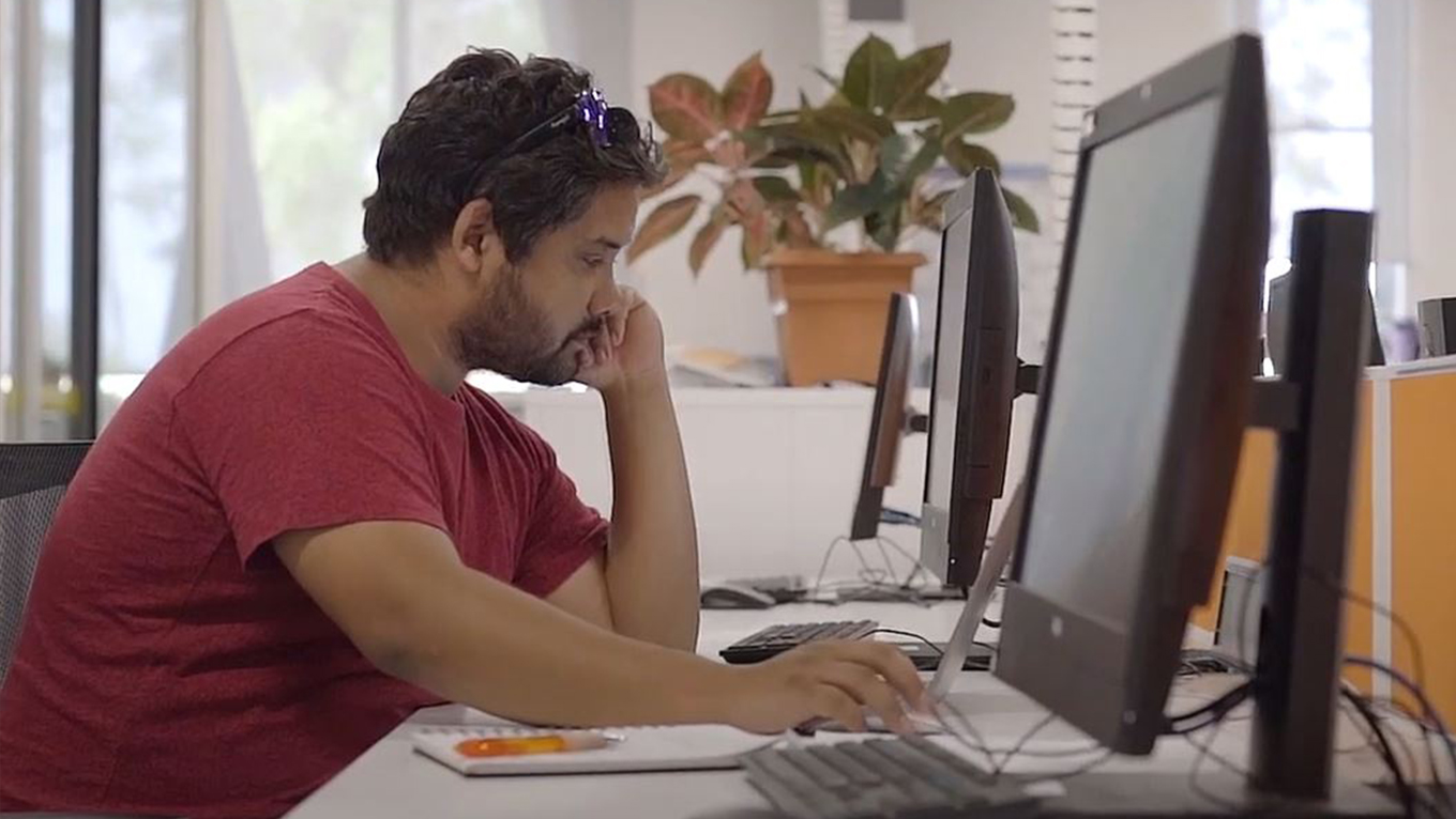 Student working at a computer. 