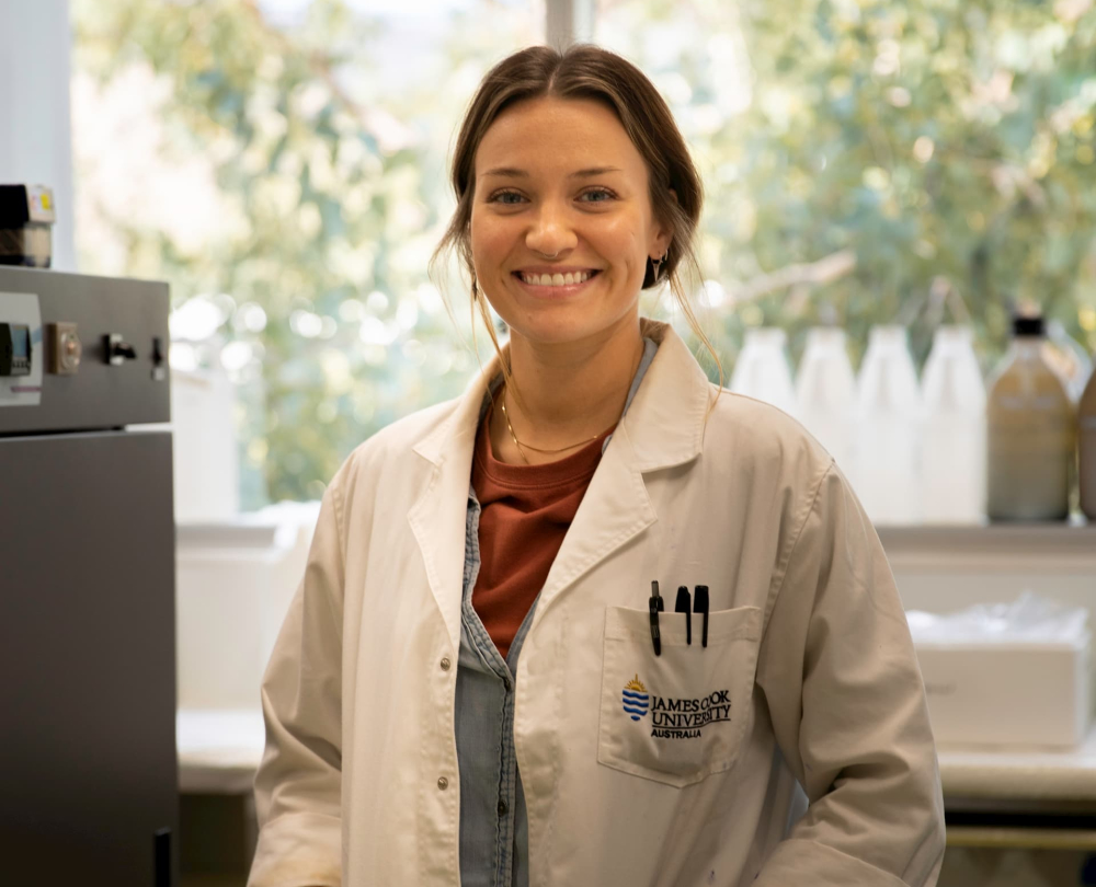 Madeline McKenzie in lab coat.