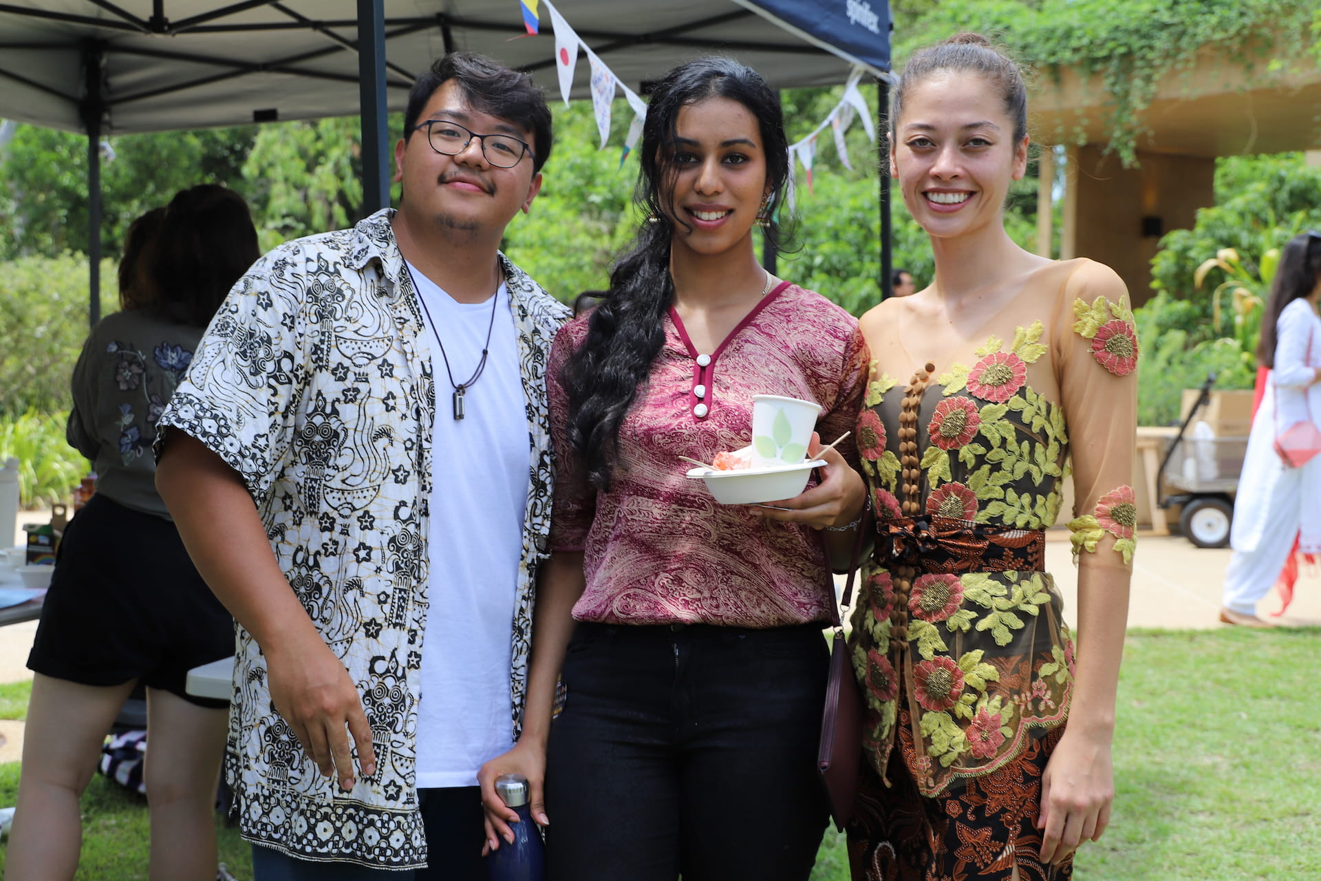 Noah Enrique Thomas (left) with fellow JCU students at Harmony Day 2022 at the Townsville Campus.