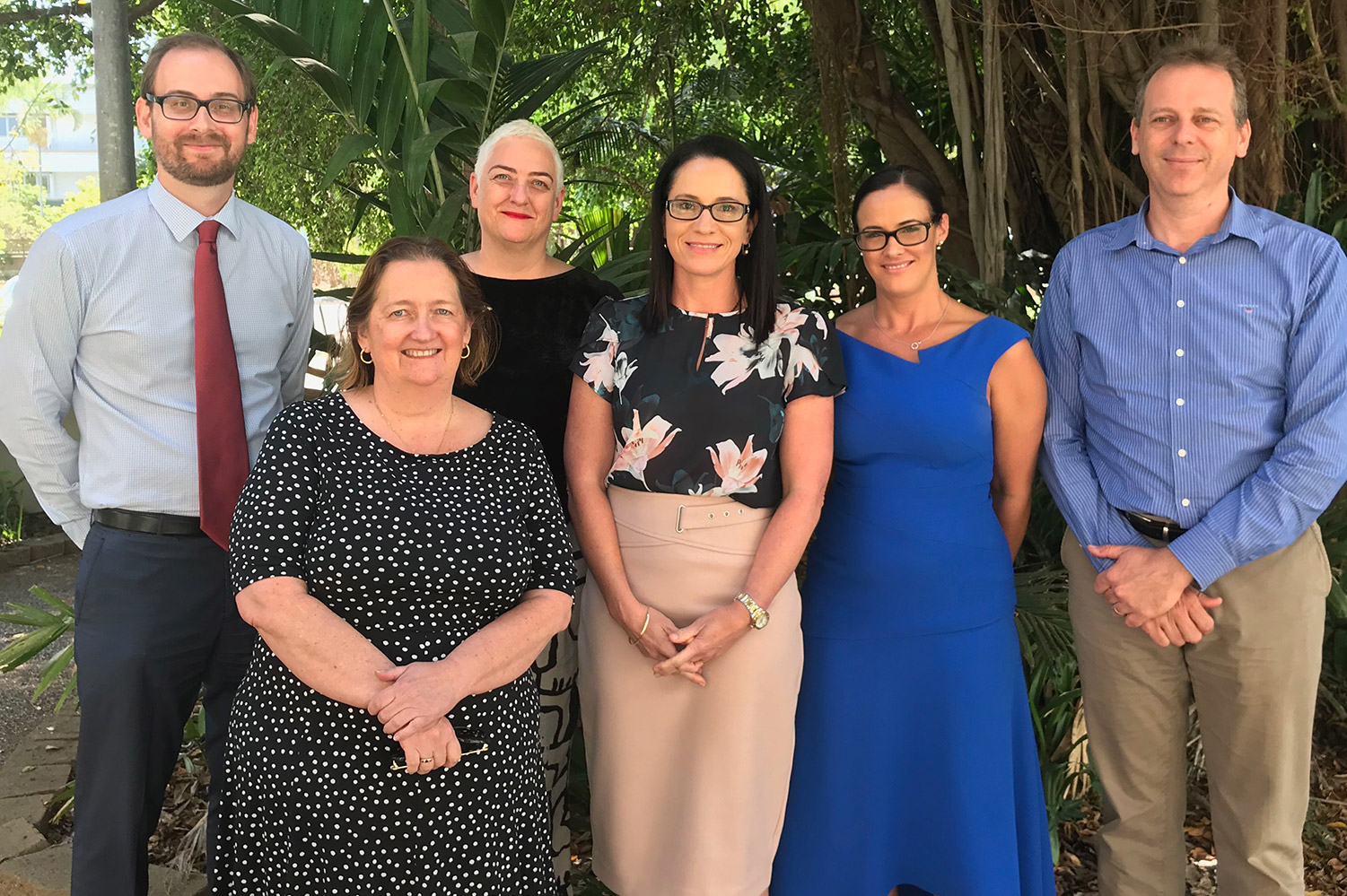 6 members of JCU Connect staff stand in a group