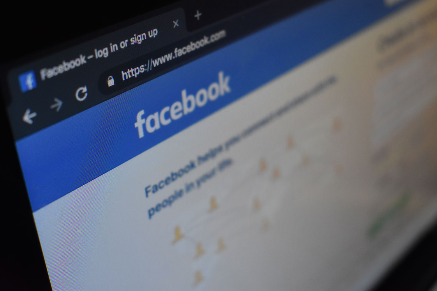 Tight shot of the Facebook login page on a laptop screen