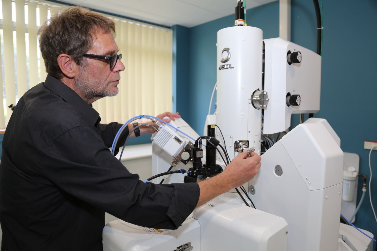 JCU Advanced Analytical Centre Director Dr Kevin Blake with the new $1.8 million Electron Probe Microanalyser, or electron microscope.