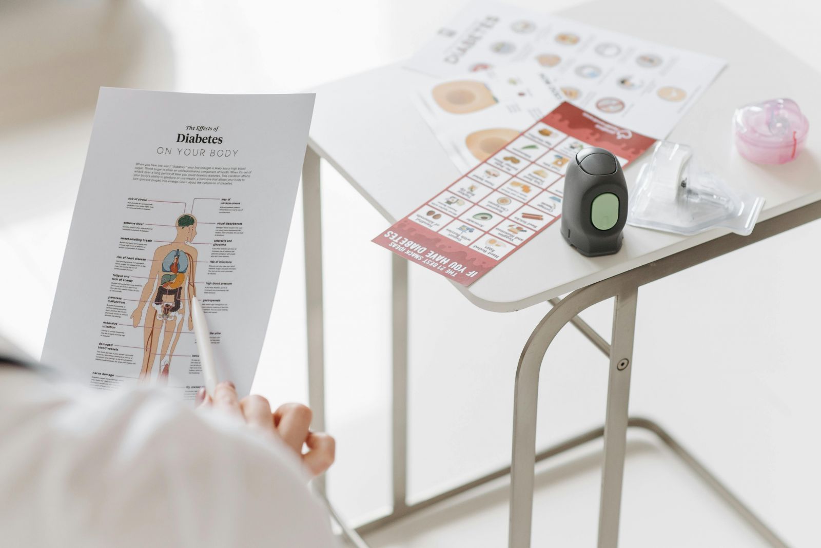 A photo of someone holding a diabetes info sheet.
