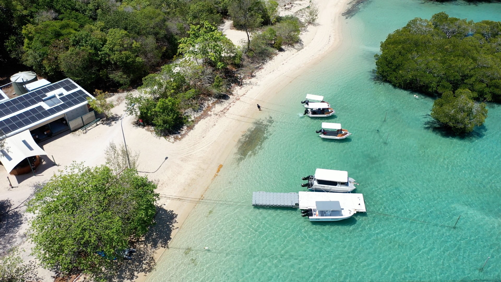 Aerial view of station and water. 