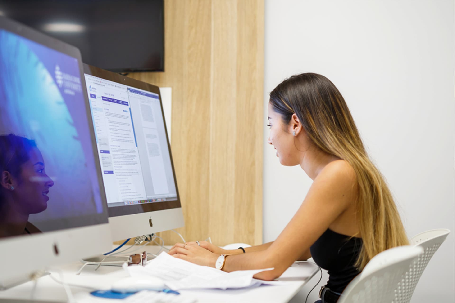 Student at a computer. 