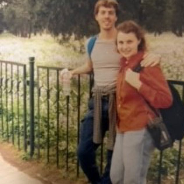 Richard Anderton next to his sister Sarah and they are both standing on front of a field