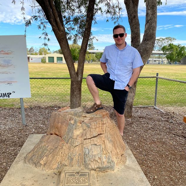 Man and tree stump